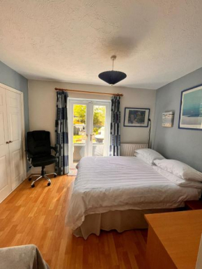 Choice of One double bedroom with a comfy double bed and private en suite for solo travellers or couples ,or alternatively book two double bedrooms for families or friends